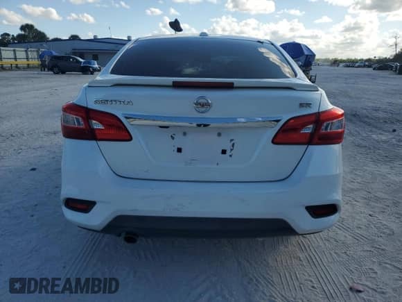 2017 Nissan Sentra SR с VIN 3N1AB7AP3HY405230, выставлен на аукционе Copart как лот 82769365 с пробегом 122 209 миль миль и Списание • Salvage title. История ставок и продаж доступна на DreamBid. Изображение 6.