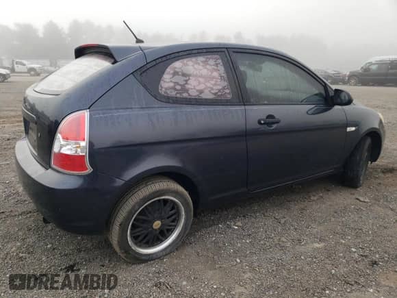2007 Hyundai Accent GS z VIN KMHCM36C87U004056, wystawiony jako Copart lot #70292314 z przebiegiem 107 760 mil mil oraz Szkoda całkowita • Salvage title. Historia ofert i sprzedaży dostępna na DreamBid. Obrazek 3.