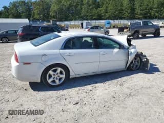 ✅ 2012 Chevrolet Malibu 1LS • VIN: 1G1ZB5E01CF168814 • Lot: 76532604. Listed on Copart with 151,433 mi. Free auction sales archive from the USA and detailed vehicle history report at DreamBid. Image 3.