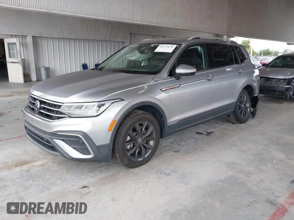 ✅ 2022 Volkswagen Tiguan SE • VIN: 3VV3B7AX7NM072475 • Lot: 43175676. Listed on IAAI with 45,366 mi. Free auction sales archive from the USA and detailed vehicle history report at DreamBid. Image 2.