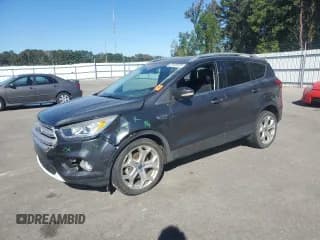 ✅ 2019 Ford Escape Titanium • VIN: 1FMCU0J90KUB94180 • Lot: 82409555. Listed on Copart with 92,744 mi. Free auction sales archive from the USA and detailed vehicle history report at DreamBid. Image 1.