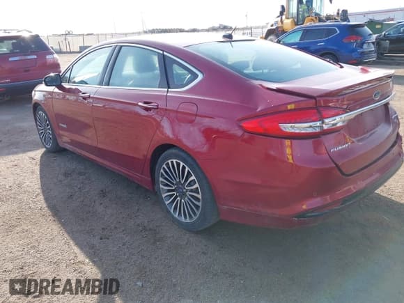 ✅ 2017 Ford Fusion Hybrid Titanium • VIN: 3FA6P0RU7HR157294 • Lot: 41909609. Listed on IAAI with 162,046 mi. Free auction sales archive from the USA and detailed vehicle history report at DreamBid. Image 3.