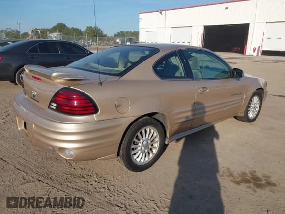 ✅ 2000 Pontiac Grand Am • VIN: 1G2NG12E6YM877102 • Lot: 43741890. Listed on IAAI with 122,686 mi. Free auction sales archive from the USA and detailed vehicle history report at DreamBid. Image 4.