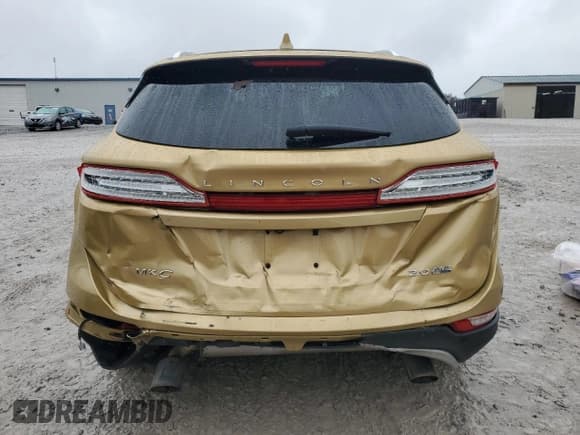 ✅ 2015 Lincoln MKC • VIN: 5LMCJ2A94FUJ24656 • Lot: 82725295. Wystawiony na Copart z przebiegiem 147 390 mil. Bezpłatny archiwum sprzedaży aukcyjnych z USA i szczegółowy raport historii pojazdu na DreamBid. Zdjęcie 6.