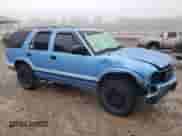 1996 Chevrolet Blazer with VIN 1GNDT13WXT2141284, listed as a Copart auction lot 73457194 with 207,648 mi miles and Salvage title. Bid and sale history available at DreamBid. Image 4.