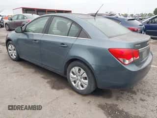 2012 Chevrolet Cruze LS z VIN 1G1PD5SH1C7225695, wystawiony jako IAAI lot #43280956 z przebiegiem 212 557 mil mil oraz . Historia ofert i sprzedaży dostępna na DreamBid. Obrazek 3.