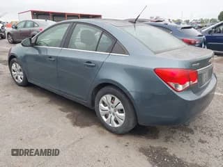✅ 2012 Chevrolet Cruze LS • VIN: 1G1PD5SH1C7225695 • Lot: 43280956. Listed on IAAI with 212,557 mi. Free auction sales archive from the USA and detailed vehicle history report at DreamBid. Image 3.