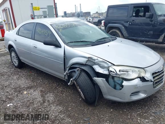 ✅ 2005 Chrysler Sebring • VIN: 1C3EL46XX5N691416 • Lot: 42685573. Listed on IAAI with 197,947 mi. Free auction sales archive from the USA and detailed vehicle history report at DreamBid. Image 6.