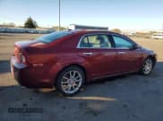 ✅ 2010 Chevrolet Malibu LTZ • VIN: 1G1ZE5E79AF131303 • Лот: 90698135. Опубликован ранее на Copart с пробегом 99 314 миль. Бесплатный доступ к архиву аукционных продаж из США и подробный отчёт об истории автомобиля на DreamBid. Изображение 3.