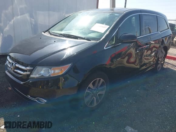 ✅ 2014 Honda Odyssey Touring • VIN: 5FNRL5H98EB095382 • Lot: 42105557. Listed on IAAI with 139,524 mi. Free auction sales archive from the USA and detailed vehicle history report at DreamBid. Image 2.
