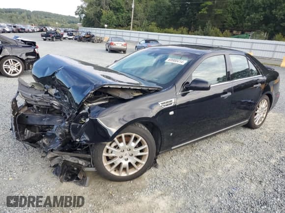 ✅ 2009 Cadillac STS RWD • VIN: 1G6DK67V990134795 • Lot: 69980414. Wystawiony na Copart z przebiegiem 108 739 mil. Bezpłatny archiwum sprzedaży aukcyjnych z USA i szczegółowy raport historii pojazdu na DreamBid. Zdjęcie 1.