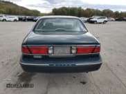 ✅ 1998 Buick LeSabre Custom • VIN: 1G4HP52K4WH522520 • Lot: 89833335. Wystawiony na Copart z przebiegiem 89 395 mil. Bezpłatny archiwum sprzedaży aukcyjnych z USA i szczegółowy raport historii pojazdu na DreamBid. Zdjęcie 6.