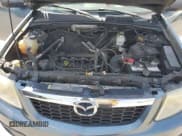 ✅ 2011 Mazda Tribute Sport • VIN: 4F2CY0C77BKM06461 • Lot: 69253675. Listed on Copart with 174,819 mi. Free auction sales archive from the USA and detailed vehicle history report at DreamBid. Image 12.