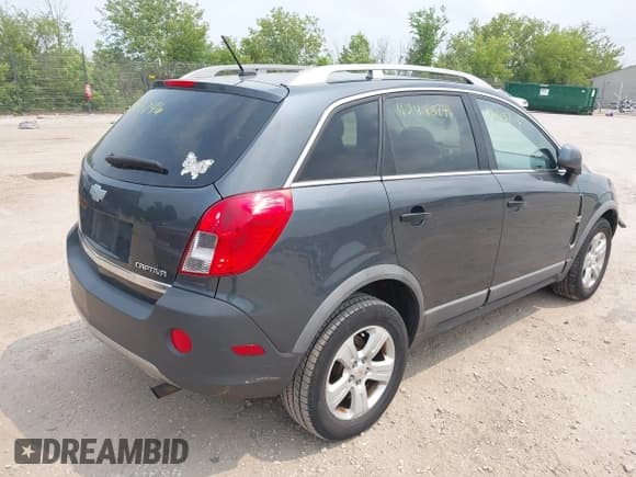 ✅ 2013 Chevrolet Captiva Sport LS • VIN: 3GNFL2EK9DS518461 • Lot: 42483746. Wystawiony na IAAI z przebiegiem 159 440 mil. Bezpłatny archiwum sprzedaży aukcyjnych z USA i szczegółowy raport historii pojazdu na DreamBid. Zdjęcie 4.
