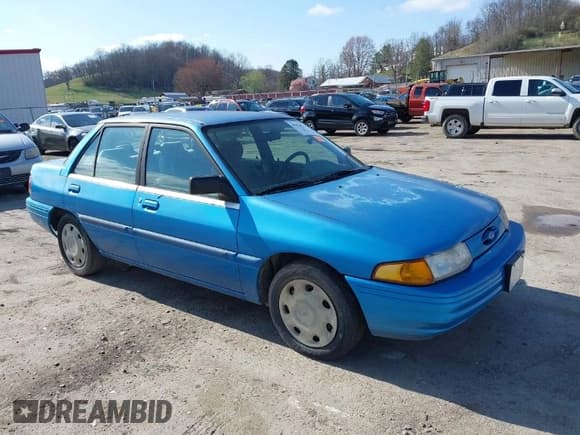 ✅ 1994 Ford Escort • VIN: 3FARP13J8RR100153 • Lot: 41934023. Listed on IAAI with 600,704 mi. Free auction sales archive from the USA and detailed vehicle history report at DreamBid. Image 1.