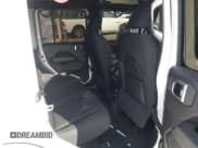 ✅ 2021 Jeep Wrangler Unlimited Sahara • VIN: 1C4HJXEN9MW506930 • Lot: 42571985. Listed on IAAI with 39,031 mi. Free auction sales archive from the USA and detailed vehicle history report at DreamBid. Image 8.