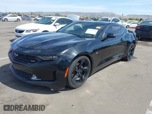 ✅ 2022 Chevrolet Camaro 1LT • VIN: 1G1FB1RX8N0133146 • Lot: 42169340. Listed on IAAI with 40,723 mi. Free auction sales archive from the USA and detailed vehicle history report at DreamBid. Image 2.