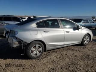✅ 2018 Chevrolet Cruze LS • VIN: 1G1BC5SM3J7203351 • Lot: 84962625. Listed on Copart with 56,771 mi. Free auction sales archive from the USA and detailed vehicle history report at DreamBid. Image 3.