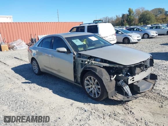 ✅ 2015 Cadillac CTS Luxury RWD • VIN: 1G6AR5SX0F0105392 • Lot: 43720160. Listed on IAAI with 77,893 mi. Free auction sales archive from the USA and detailed vehicle history report at DreamBid. Image 1.