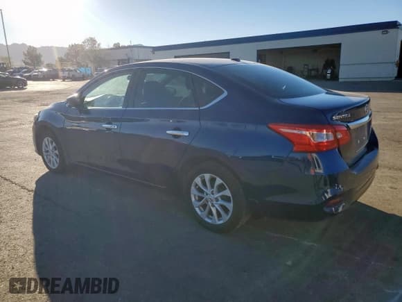 ✅ 2019 Nissan Sentra SV • VIN: 3N1AB7AP8KL612152 • Лот: 90536645. Опубликован ранее на Copart с пробегом 85 376 миль. Бесплатный доступ к архиву аукционных продаж из США и подробный отчёт об истории автомобиля на DreamBid. Изображение 2.