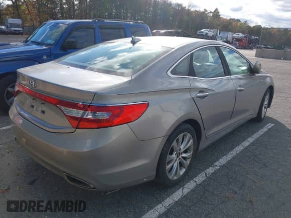 2013 Hyundai Azera with VIN KMHFG4JG3DA329523, listed as a IAAI auction lot 43593562 with 93,702 mi miles and . Bid and sale history available at DreamBid. Image 4.