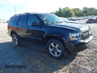 2011 Chevrolet Tahoe LT with VIN 1GNSCBE01BR276620, listed as a IAAI auction lot 43347276 with 208,456 mi miles and . Bid and sale history available at DreamBid. Image 1.