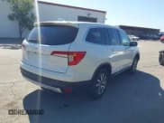 ✅ 2021 Honda Pilot EX • VIN: 5FNYF5H37MB038393 • Lot: 42649919. Wystawiony na IAAI z przebiegiem 87 222 mil. Bezpłatny archiwum sprzedaży aukcyjnych z USA i szczegółowy raport historii pojazdu na DreamBid. Zdjęcie 4.