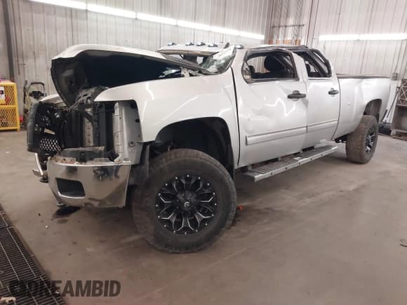 ✅ 2014 Chevrolet Silverado 2500HD LT • VIN: 1GC1KXC89EF108663 • Lot: 41857376. Listed on IAAI with Not provided. Free auction sales archive from the USA and detailed vehicle history report at DreamBid. Image 2.