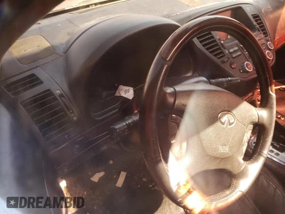 ✅ 2005 Infiniti Q45 • VIN: JNKBF01A75M100612 • Лот: 73658824. Опубликован ранее на Copart с пробегом Не указан. Бесплатный доступ к архиву аукционных продаж из США и подробный отчёт об истории автомобиля на DreamBid. Изображение 9.