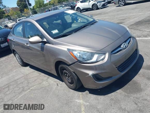 2014 Hyundai Accent GLS with VIN KMHCT4AE8EU655136, listed as a IAAI auction lot 42797016 with 102,554 mi miles and . Bid and sale history available at DreamBid. Image 1.
