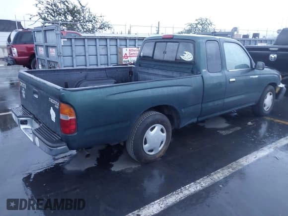 ✅ 1999 Toyota Tacoma • VIN: 4TAVL52N6XZ530719 • Lot: 43753647. Listed on IAAI with 240,331 mi. Free auction sales archive from the USA and detailed vehicle history report at DreamBid. Image 4.