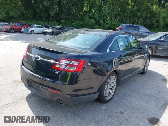 ✅ 2013 Ford Taurus Limited • VIN: 1FAHP2J86DG118426 • Lot: 42727545. Listed on IAAI with 186,289 mi. Free auction sales archive from the USA and detailed vehicle history report at DreamBid. Image 4.