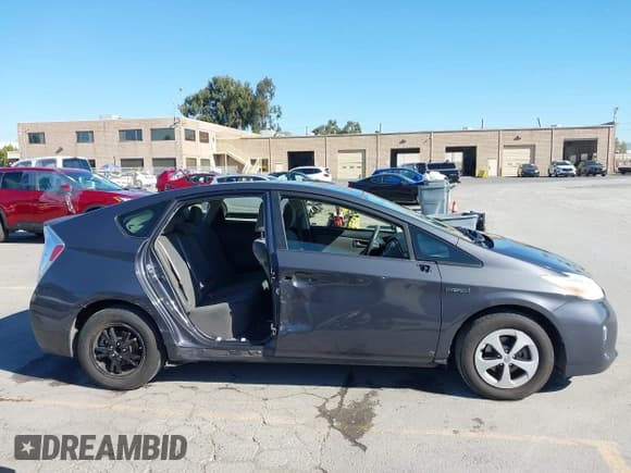 ✅ 2014 Toyota Prius Four • VIN: JTDKN3DU7E1779102 • Лот: 43562096. Опубликован ранее на IAAI с пробегом 98 799 миль. Бесплатный доступ к архиву аукционных продаж из США и подробный отчёт об истории автомобиля на DreamBid. Изображение 14.