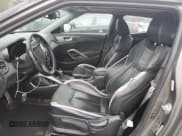 ✅ 2014 Hyundai Veloster Turbo • VIN: KMHTC6AE3EU191684 • Lot: 45010365. Wystawiony na Copart z przebiegiem 176 773 mil. Bezpłatny archiwum sprzedaży aukcyjnych z USA i szczegółowy raport historii pojazdu na DreamBid. Zdjęcie 7.