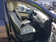 ✅ 2016 Mazda CX-5 Grand Touring • VIN: JM3KE4DY8G0666879 • Lot: 43322818. Listed on IAAI with 104,077 mi. Free auction sales archive from the USA and detailed vehicle history report at DreamBid. Image 5.