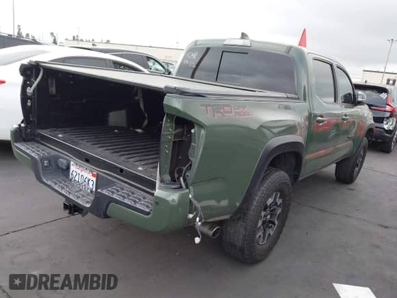 2022 Toyota Tacoma SR5 with VIN 3TMAZ5CN5NM168283, listed as a IAAI auction lot 43322779 with 35,521 mi miles and . Bid and sale history available at DreamBid. Image 4.