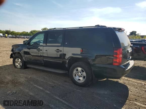 2013 Chevrolet Suburban LT with VIN 1GNSKJE79DR150003, listed as a Copart auction lot 80715615 with 164,810 mi miles and Salvage title. Bid and sale history available at DreamBid. Image 2.