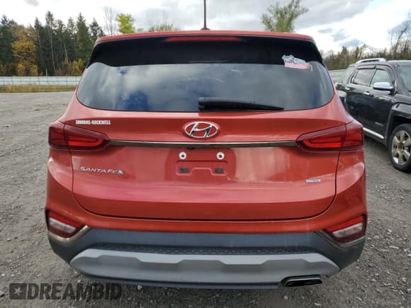 ✅ 2019 Hyundai Santa Fe SE • VIN: 5NMS2CAD9KH004282 • Lot: 82761295. Wystawiony na Copart z przebiegiem 63 053 mil. Bezpłatny archiwum sprzedaży aukcyjnych z USA i szczegółowy raport historii pojazdu na DreamBid. Zdjęcie 6.