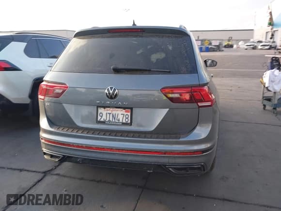 ✅ 2023 Volkswagen Tiguan SE R-Line Black • VIN: 3VVCB7AX7PM122004 • Лот: 43344585. Опубликован ранее на IAAI с пробегом 22 325 миль. Бесплатный доступ к архиву аукционных продаж из США и подробный отчёт об истории автомобиля на DreamBid. Изображение 17.