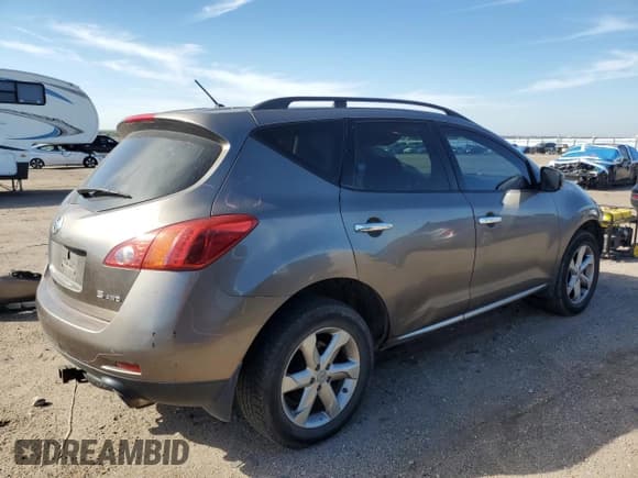 ✅ 2009 Nissan Murano LE • VIN: JN8AZ18W09W106780 • Лот: 82403285. Опубликован ранее на Copart с пробегом 242 577 миль. Бесплатный доступ к архиву аукционных продаж из США и подробный отчёт об истории автомобиля на DreamBid. Изображение 3.