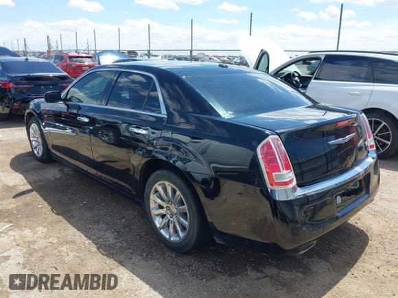 ✅ 2012 Chrysler 300 C • VIN: 2C3CCAET8CH309247 • Lot: 42460648. Listed on IAAI with 121,168 mi. Free auction sales archive from the USA and detailed vehicle history report at DreamBid. Image 3.