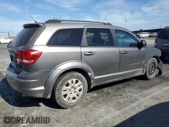 ✅ 2013 Dodge Journey SE • VIN: 3C4PDCAB8DT711877 • Lot: 70142965. Listed on Copart with 134,337 mi. Free auction sales archive from the USA and detailed vehicle history report at DreamBid. Image 3.