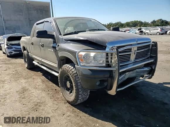 2007 Dodge 1500 SLT z VIN 3D7KS19D47G819989, wystawiony jako Copart lot #76620984 z przebiegiem 167 604 mil mil oraz Szkoda całkowita • Salvage title. Historia ofert i sprzedaży dostępna na DreamBid. Obrazek 10.
