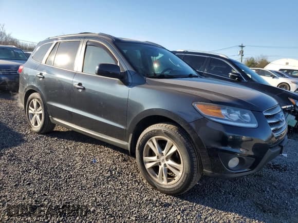 ✅ 2012 Hyundai Santa Fe Limited • VIN: 5XYZKDAGXCG107284 • Lot: 82957034. Listed on Copart with 223,687 mi. Free auction sales archive from the USA and detailed vehicle history report at DreamBid. Image 4.