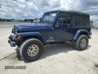 ✅ 2005 Jeep Wrangler Unlimited • VIN: 1J4FA44S05P318090 • Lot: 80614705. Listed on Copart with 888,888 mi. Free auction sales archive from the USA and detailed vehicle history report at DreamBid. Image 1.