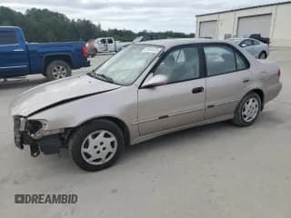 ✅ 1999 Toyota Corolla LE • VIN: 1NXBR12E6XZ148570 • Лот: 81554415. Опубликован ранее на Copart с пробегом 264 960 миль. Бесплатный доступ к архиву аукционных продаж из США и подробный отчёт об истории автомобиля на DreamBid. Изображение 1.