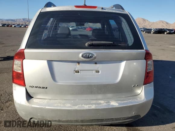 ✅ 2009 Kia Rondo LX • VIN: KNAFG528597247666 • Lot: 91951305. Wystawiony na Copart z przebiegiem 103 966 mil. Bezpłatny archiwum sprzedaży aukcyjnych z USA i szczegółowy raport historii pojazdu na DreamBid. Zdjęcie 6.