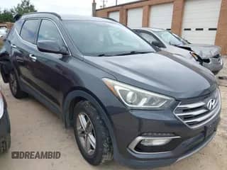 2017 Hyundai Santa Fe 2.4L z VIN 5XYZU3LB1HG489475, wystawiony jako IAAI lot #43019963 z przebiegiem 121 219 mil mil oraz . Historia ofert i sprzedaży dostępna na DreamBid. Obrazek 1.