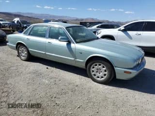 ✅ 2000 Jaguar XJ • VIN: SAJDA14C1YLF10459 • Лот: 65583394. Опубликован ранее на Copart с пробегом 113 333 миль. Бесплатный доступ к архиву аукционных продаж из США и подробный отчёт об истории автомобиля на DreamBid. Изображение 4.