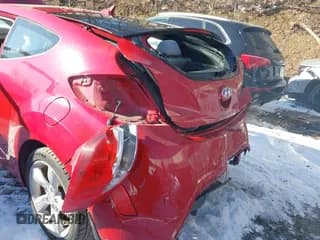 ✅ 2013 Hyundai Veloster w/Black Int • VIN: KMHTC6AD9DU093541 • Lot: 41585034. Wystawiony na IAAI z przebiegiem 66 883 mil. Bezpłatny archiwum sprzedaży aukcyjnych z USA i szczegółowy raport historii pojazdu na DreamBid. Zdjęcie 6.